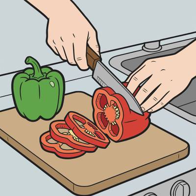 Ausgemalte Version: Paprika wird auf dem Brett geschnitten
